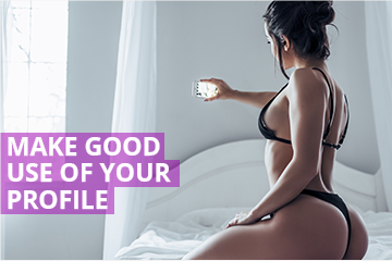 Woman on bed taking selfie