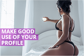 Woman on bed taking selfie